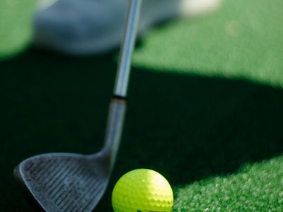 Close up of sports shoes on turf
